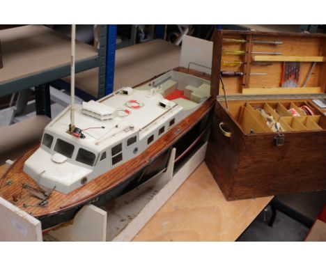 A mid 20th Century radio controlled boat, resembling a military / coastguard craft, 3½&nbsp; ft long, in original condition A