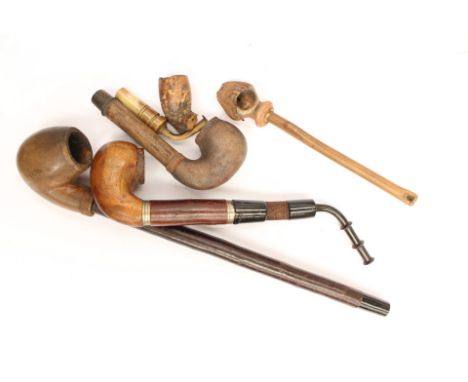Collection of pipe smoking paraphernalia 19th and 20th Century