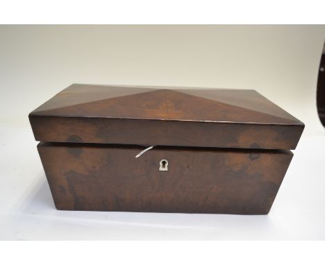 A Regency walnut tea caddy of sarcophagus from&nbsp;