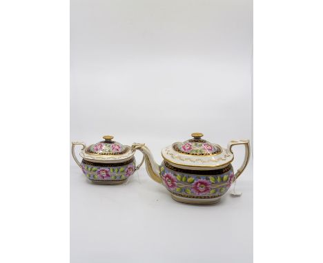 An early 19th century teapot and cover and matching sucrier and cover, painted with flowers and leaves on a pale blue ground.