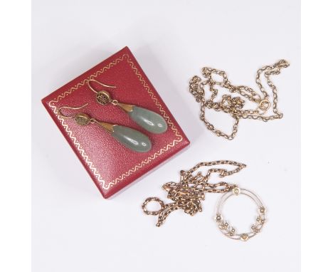 An Edwardian seed pearl and unmarked yellow metal pendant, tests as 9ct gold, circular openwork design with seed pearl set fl