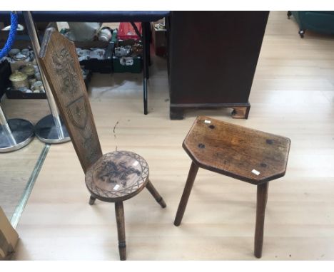 An 18th Century elm and ash milking stool together with a carved stick back chair&nbsp;