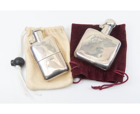 A George V Sterling silver hip flask, Birmingham 1926, maker’s marks rubbed, together with a further George V Sterling silver