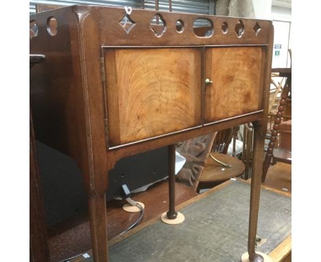 A George III mahogany night commode circa 1770 with pierced gallery.