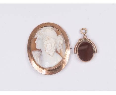 A 9ct gold mounted cameo brooch, approx 11 grams gross; and a 9ct swivel fob set carnelian and bloodstone