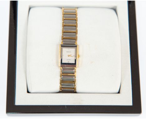 A Rado ladies jubilee tank watch with jewelled steel link strap, original box and packaging