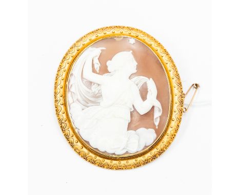 A Victorian cameo brooch depicting classical scene of Diana, Etruscan revival style surround with granular bead and filigree 