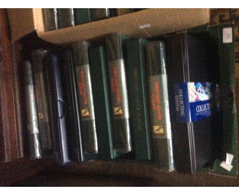 A collection of ten GB stamp albums, containing mixed First Day Covers and mint stamp issues