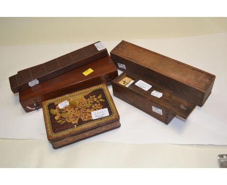 Vintage games, to include three boxes of bone dominoes, a travel chess board and a cribbage board (5)