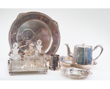 Group of silver plated items including a stand with four glass bottles, Walker &amp; Hall entree dish, teapot, milk jug, Mapp