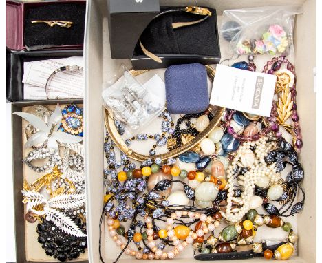 A collection of costume jewellery to include various vintage paste set brooches and a buckle, two Art Deco double clip brooch