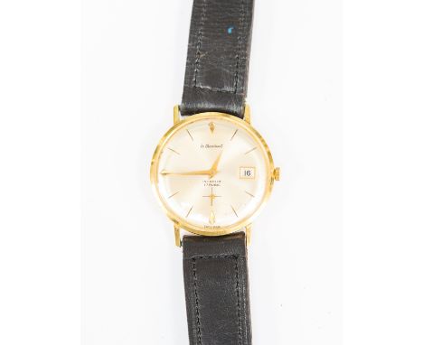 An 18ct gold gents Le Cheminant incabloc wristwatch circa 1960s, winding mechanical movement, round champagne dial, batons an