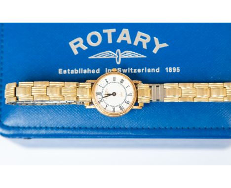 A 9ct gold ladies Rotary watch, enamel dial, Roman numerals, on later plated strap