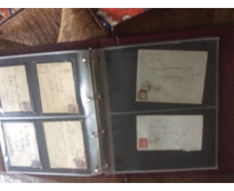 An Album of stamps including early Victorian stamped covers (including a 2d blue) and 1940s First Day Covers, together with a