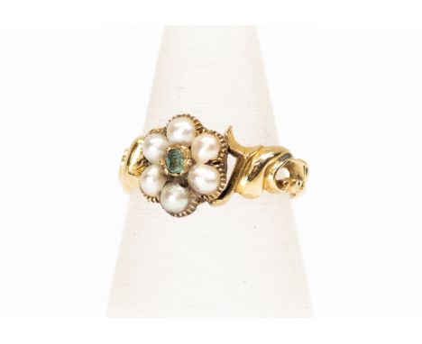 An early Victorian seed pearl and green stone set ring, possibly emerald, scroll mount, unmarked yellow metal possibly 15ct g