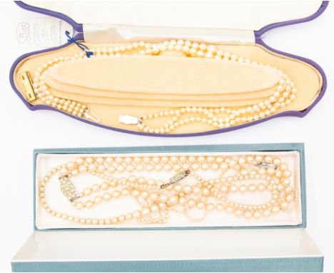 A three row graduated cultured pearl necklace, largest pearl approx. 7mm, smallest approx. 3.8mm, on a silver and marcasite c