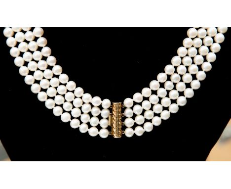 A four strand cultured pearl necklace, white with pink overtone, pearl size approx 7mm, shortest strand length approx 17'', l
