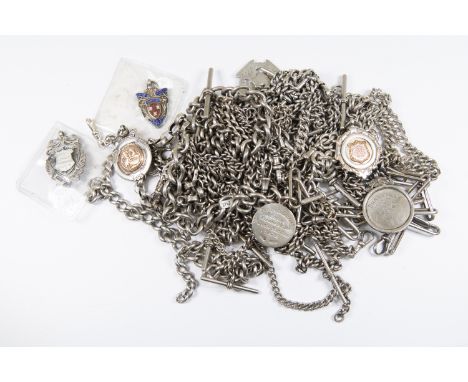 A collection&nbsp; of nineteen silver fob chains and medallions including Albert and lozenge styles with a combined total gro