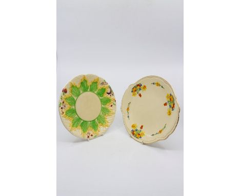 Clarice Cliff for Newport Pottery, two 'Spring Crocus'&nbsp; oval platters, together with two other Clarice Cliff. (4) Size; 