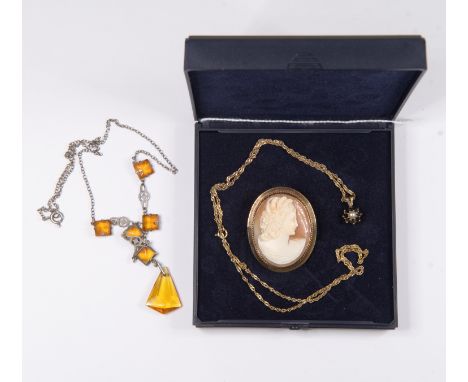 A 9ct gold mounted cameo brooch, size approx 35 mm x 28 mm, along with a 9ct gold sapphire and pearl cluster pendant on a 9ct
