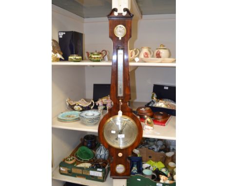 A 19th Century Samuel of Louth rosewood aneroid barometer, incorporating a spirit level