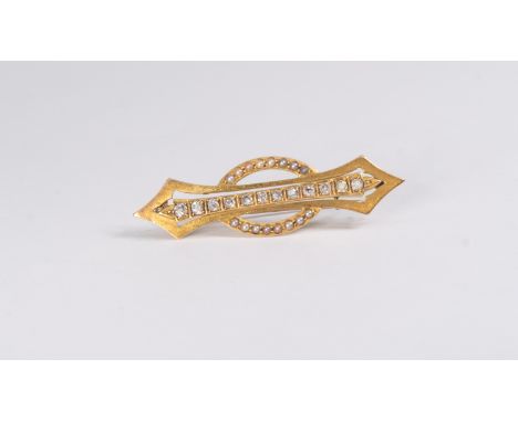 An Edwardian diamond and pearl set brooch,&nbsp; unmarked yellow metal gold, assessed as 15ct, length approx 50mm, total gros