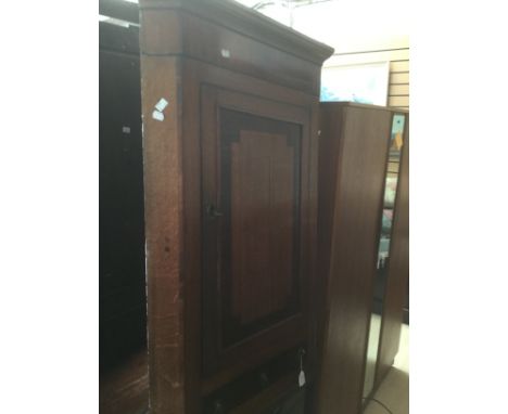 A George III mahogany chest of drawers, circa 1820, fitted with three long graduated drawers, raised on bracket feet and&nbsp
