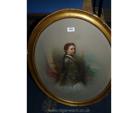 An early 20th c. Watercolour of full length study of woman in a landscape, oval frame, possibly over print base.