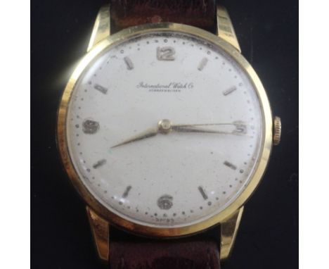 A gentleman's 18ct gold International Watch Co. manual wind dress wrist watch, with baton and quarterly Arabic numerals, the 