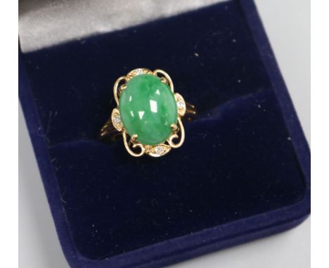 A 14ct gold jade and diamond set dress ring, size O.