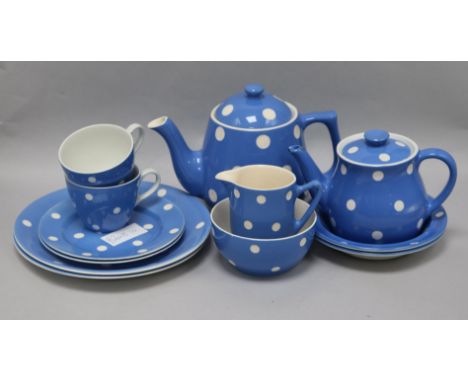 A blue polka dot tea service