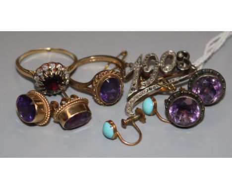 A group of gold mounted jewellery including a diamond set ring and a diamond set "1903" brooch.