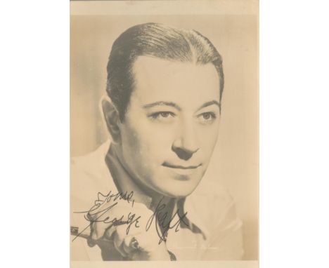 Actor George Raft signed 7 x 5 inch sepia vintage portrait photo. Good condition. All autographs come with a Certificate of A