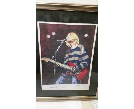 POP MUSIC, colour print showing Kurt Cobain, half-length performing in striped jumper, signed by the artist Paul Howell, LE79