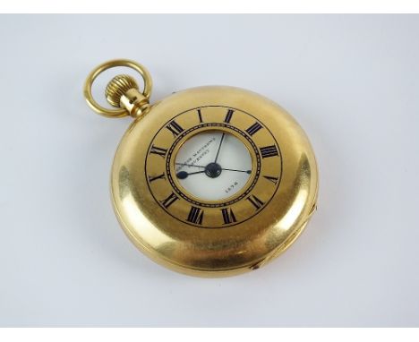 A Gentleman's 18ct gold half hunter pocket watch, Chester 1928, the white enamel dial with black Roman numerals and outer rin