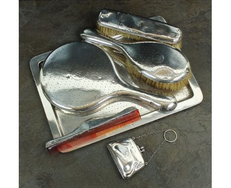 A five part silver dressing table set, Horace Woodward & Co Ltd, Birmingham 1912 & 1913, each piece with repeating dotted dec