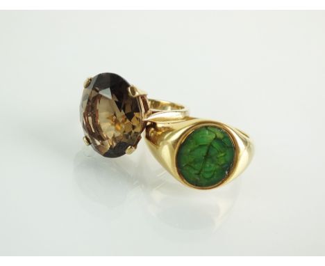 A 9ct gold smoky quartz single stone ring, the yellow gold shank hallmarked London 1989, ring size K 1/2, together with a har