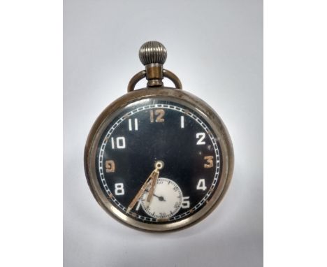 Military pocket watch with black dial  marked to the back with broad arrow G S/TP MKII S C52291