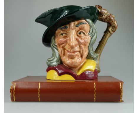 Royal Doulton large character jug lamp Pied Piper mounted on a leather book 