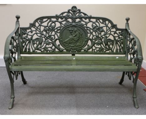 Reproduction cast iron medallion back garden bench, length 132cm