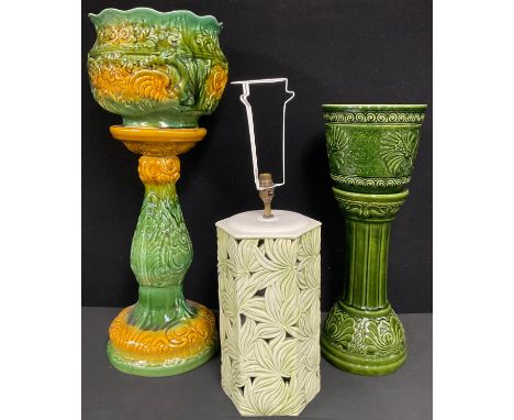 A Bay West German lava type jardiniere and stand, shape number 673-22, 59cm high; a majolica jardiniere and stand, 20th centu