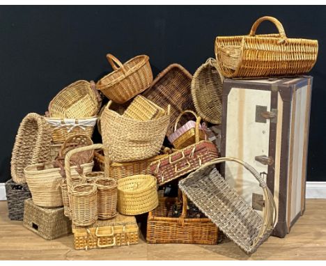 A large quantity of wicker ware, including log basket, wine bottle holder, bread baskets, hampers, shopping baskets, etc; a s
