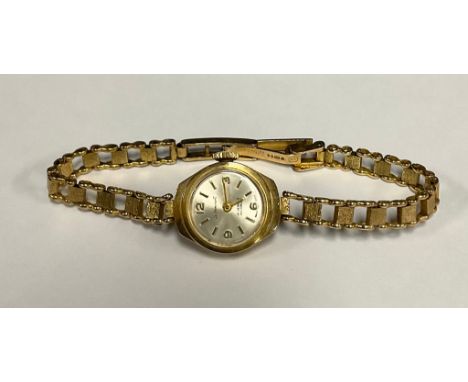 A Le Cheminant 9ct gold cased lady's bracelet watch, manual wind movement, with fancy link 9ct gold strap, 13.3g gross, (stra