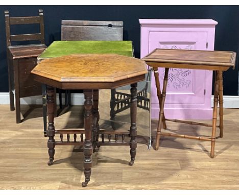 A late Victorian/Edwardian walnut and marquetry octagonal centre table; a walnut and faux-bamboo butler’s serving tray on sta