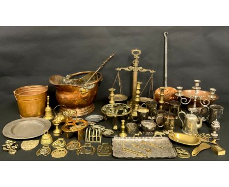 Metalware - a copper helmet shaped coal scuttle; a set of 19th century style brass balance scales; a 19th century copper ches