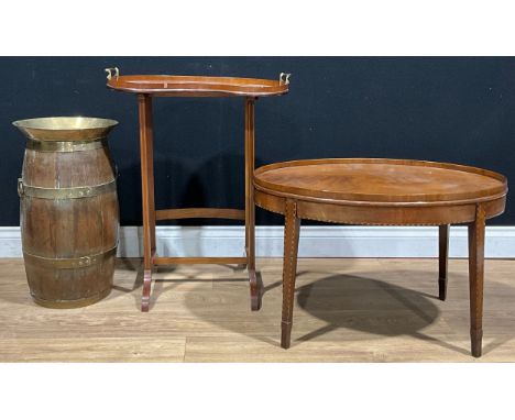 A brass bound coopered oak walking stick or umbrella stand, 58cm high; an Edwardian mahogany kidney shaped serving tray on st