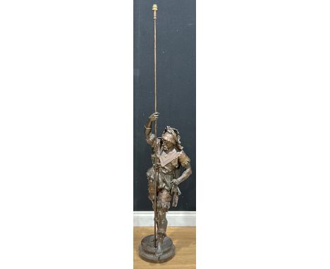 An early 20th century bronzed spelter figural floor lamp, modelled as a Flemish foot soldier, 163cm high