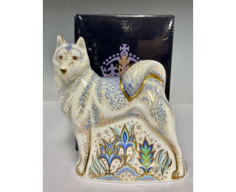 A Royal Crown Derby paperweight, Husky, gold stopper, 16cm, signed in gold by Hugh Gibson, printed mark in red, boxed