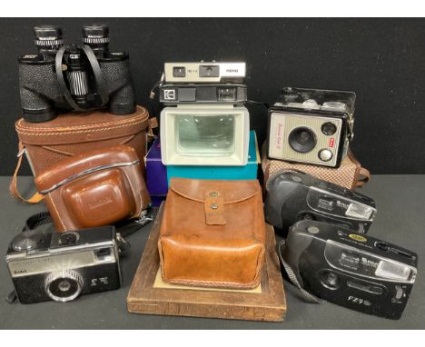 A box of Kodak cameras, including Brownie Flash III; Tele-Insamatic 330; Retinette Pronto-LK; Photax Solar 3, etc; Swift bino