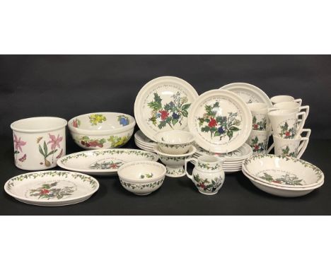 A Portmeirion Holly &amp; The Ivy pattern part dinner service, comprising dinner plates, dessert plates, mugs, dishes, bowls,